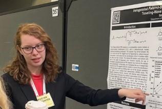 Portrait of Hannah Hynds, speaker, presenting a poster