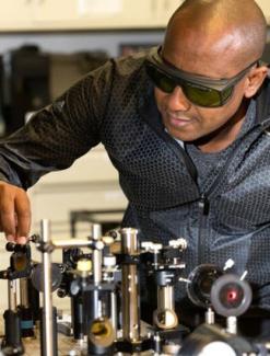 Speaker Yohannes Abate in lab setting