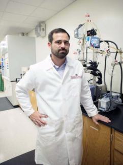 Portrait of Dr. Jason Locklin in his lab