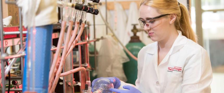 Chemistry undergraduate student Kaitlin Luedecke working in a laboratory.