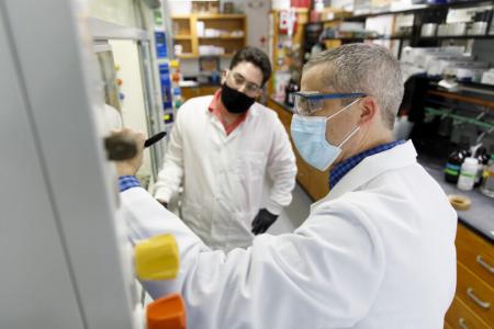 Dr. Eric Ferreira in lab