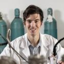 Photo of Nicholas Dewey, DOE Award Winner, in a lab setting